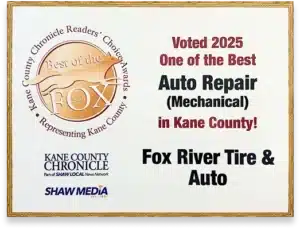A plaque reads: Best of the Fox 2025. Voted 2025 One of the Best Auto Repair (Mechanical) in Kane County! Fox River Tire & Auto. Logos for Kane County Chronicle and Shaw Media are also present.